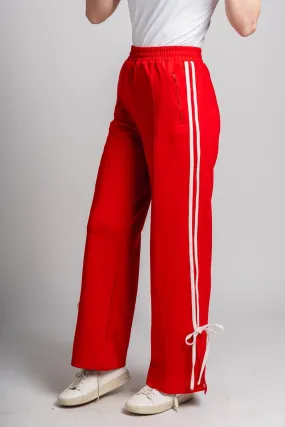 Bow detail track pants red